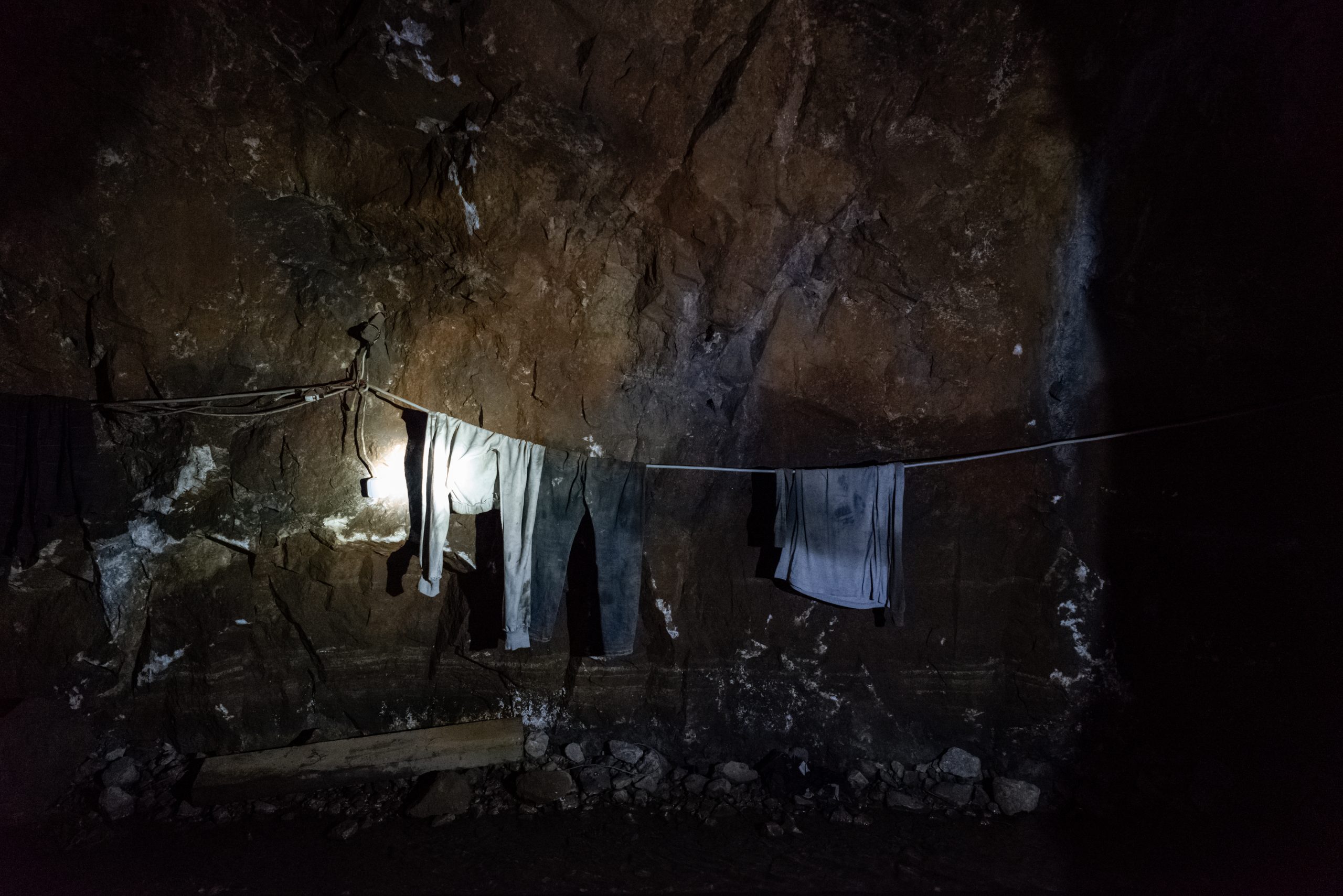 Clothes hanging to dry on a rope on the 10th underground level of the Trepça mining facilities in Stan Terg.